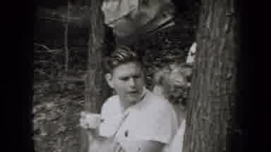 New York USA (1938): Two Guys Sitting Next To The River Looking To Start Fishing