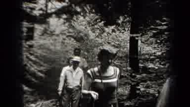 NEW YORK USA-1938: Small Group Of Young People Hiking Through The Woods During