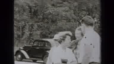 New York USA (1938): Black And White Video Shot Of People Talking Near A Car In