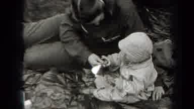 New York USA (1938): Baby Playing With Caring Mother