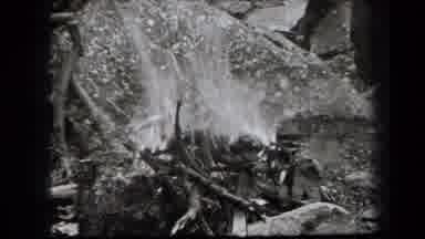 New York USA (1938): Man Starts Camping Fire Before Heading Taking In The View And