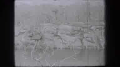 New York USA (1938): Winter Scenic Shot Of Snowy Mountains Near A Body Of Water