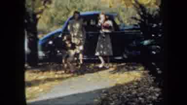 New York USA (1939): Two Women Getting Out Of A Car Walking With A Toddler Female