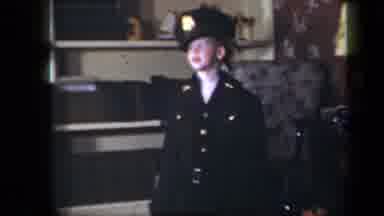 New York USA (1939): Child In Officers Uniform Walking Around In A Room Going To