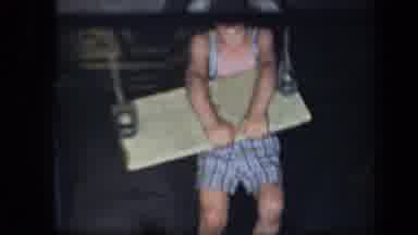 New York USA (1939): Home Video Of A Young Boy Swinging In His Backyard