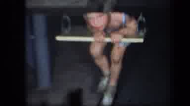 New York USA (1939): A Little Boy Is Holding Onto The Swing To Swing Back And