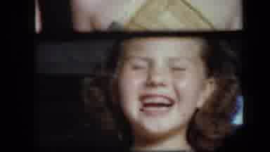 New York USA (1939): Young Girl With Yellow Dress Laughing While Swinging Back And