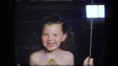New York USA (1939): Beautiful Little Girl In Gold Dress Holding A Balloon And