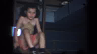 New York USA (1939): Little Girl Sliding Down Slide Near Desk And Little Boy