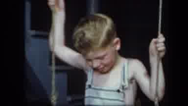New York USA (1939): Boy On Swing Next To Stairs And Girl With Curly Hair Playing