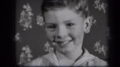 New York USA (1939): Boy Reacting To Something Funny With A Belly Laugh