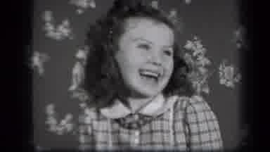 New York USA (1939): A Beautiful Little Girl Reading A Book With A Big Smile And
