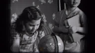 New York USA (1939): A Girl Playing With A Globe Map