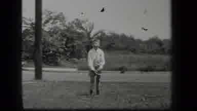 New York USA (1939): Young Boy Stepping Up To Imaginary Pick Up Game Plate