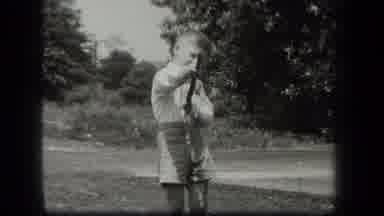New York USA (1939): Black And White Classic Clip Of Boy Playing With Stick