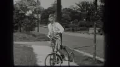 New York USA (1939): Little Boy With A Bicycle