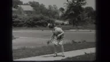 New York USA (1939): A Girl Is Bouncing A Ball