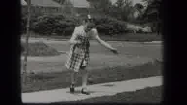 New York USA (1939): Girl Playing Ball In Street Black And White Footage