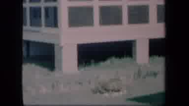 New York USA-1958: A Vintage Film Displaying An Empty Screened Porch Along With