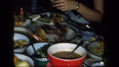 New York USA (1958): Family Eating Turkey Dinner Together At Dining Room Table