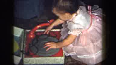 New York USA (1958): Girl Toddler In Pink Tulle Dress Playing With Record Player