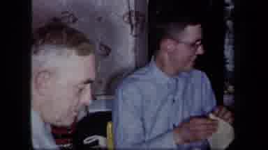 New York USA (1958): Family Dinner Time Father And Son Eating In The Kitchen