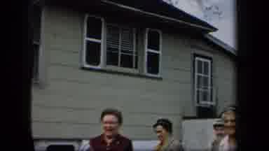 New York USA (1958): People Walking Past A House Outside In The Fall Or Winter