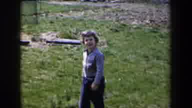 New York USA (1959): Boy Petting Dog Outside