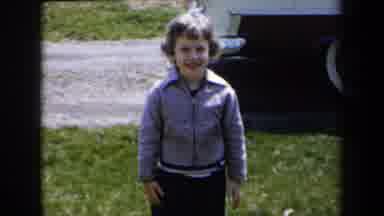 New York USA (1959): Little Kid Crawling Around In The Front Yard As His Mom Comes