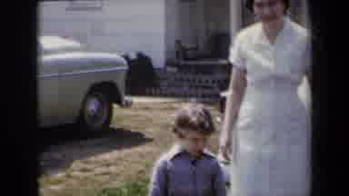 New York USA (1959): Little Kid Next To His White Dress Sitting Next To The Dog On