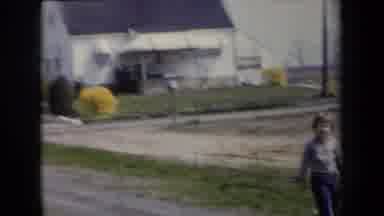 New York USA (1959): Two Old Clips Combined Of Child Walking Down A Street Past A