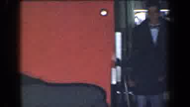New York USA (1959): A Well-Dressed Young Man Confidently Enters A Room By Dancing