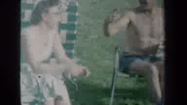 New York USA (1959): Family Hanging Out In Yard On Lawn Chairs Holiday Tree