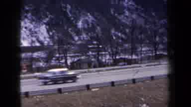 New York USA (1959): Cars Cliff Brown Road Guardrail People Snow Walking Driving