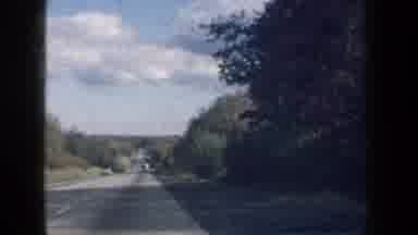 New York USA (1959): A View Of A Person Driving Looking At The Scenery Full Of Big