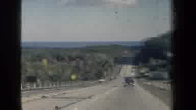 New York USA (1959): A Drive Down The Highway Towards Blue Waters On A Sunny Day