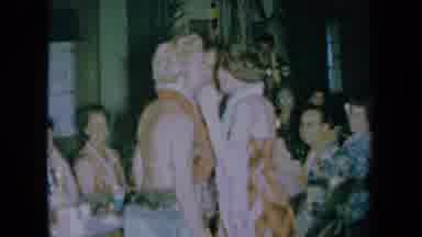 California USA (1961): A Woman Kisses A Man At His Hawaiian Wedding