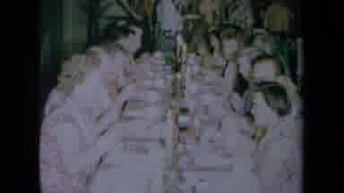 California USA (1961): People Eating At A Long Rectangular Table For A Large Meal