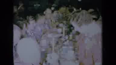 California USA (1961): A Large Group Of People Having A Festive (Christmas?) Meal