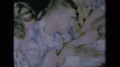 California USA (1961): Young Girls In Hawaiian Dresses Dancing In A Room While