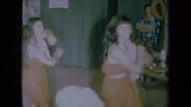 California USA (1961): Two Young Girls Competing In A Hula Dancing Competition