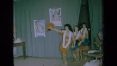 California USA (1961): Women Dancing A Hawaiian Inspired Dance At An Event