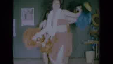 California USA (1961): Two Girls Dancing With Things Around Their Necks Having Fun
