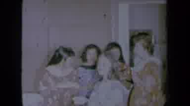 California USA (1961): A Group Of Girls Socializing In Pajamas And A Girl Throwing
