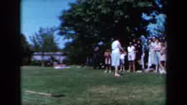 California USA (1961): Group Of Men And Women In The Sunny Outdoors Enjoying