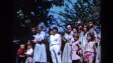 California USA (1961): Girl Throwing Javelin In Competition With People And