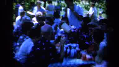 California USA (1961): Large Gathering Showing A Closer Look At A Male Drinking
