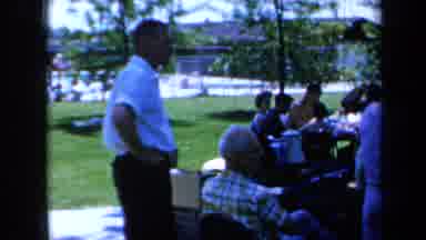 California USA (1961): A Group Of Family Members Having A Good Time At A Big