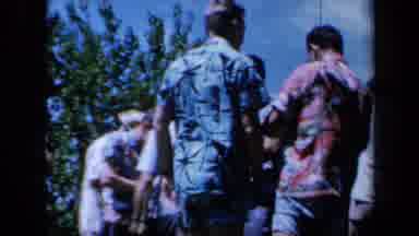 California USA (1961): Men In Hawaiian Shirts Celebrating And Then Grabbing Their