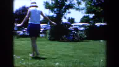 California USA (1961): People In The Park Having Fun Running And Playing Games